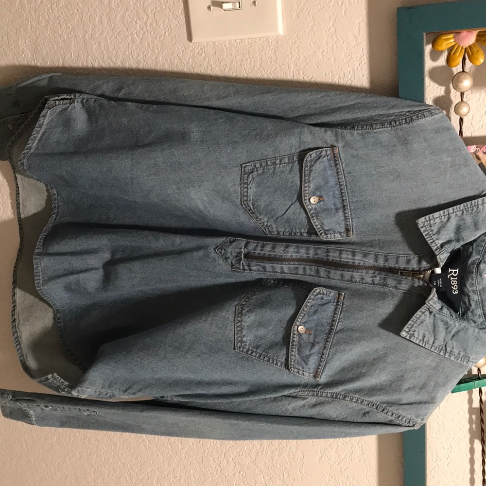 L size minor tearing on left side